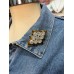 Broche Flor Animal Print Dourado